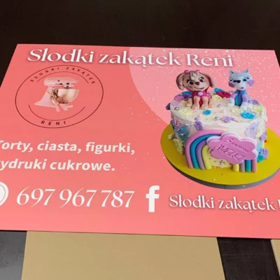Różowa tablica Słodki Zakątek Reni z grafiką tortu – tablice i szyldy reklamowe z dibondu
