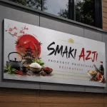 Szyld reklamowy z dibondu srebrny szczotkowany dla restauracji azjatyckiej