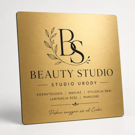 Tablica z dibondu w szczotkowanym złocie dla beauty studio