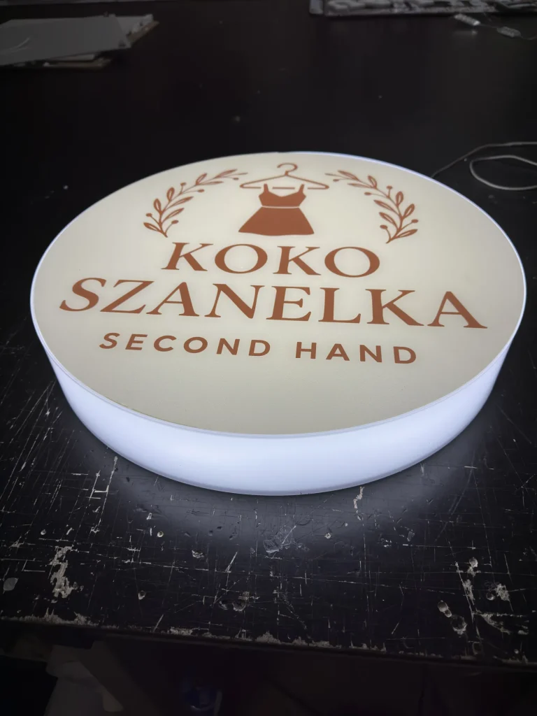 Okrągły kaseton reklamowy dwustronny frezowany z logo