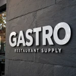 Białe litery z Dibondu – napis GASTRO