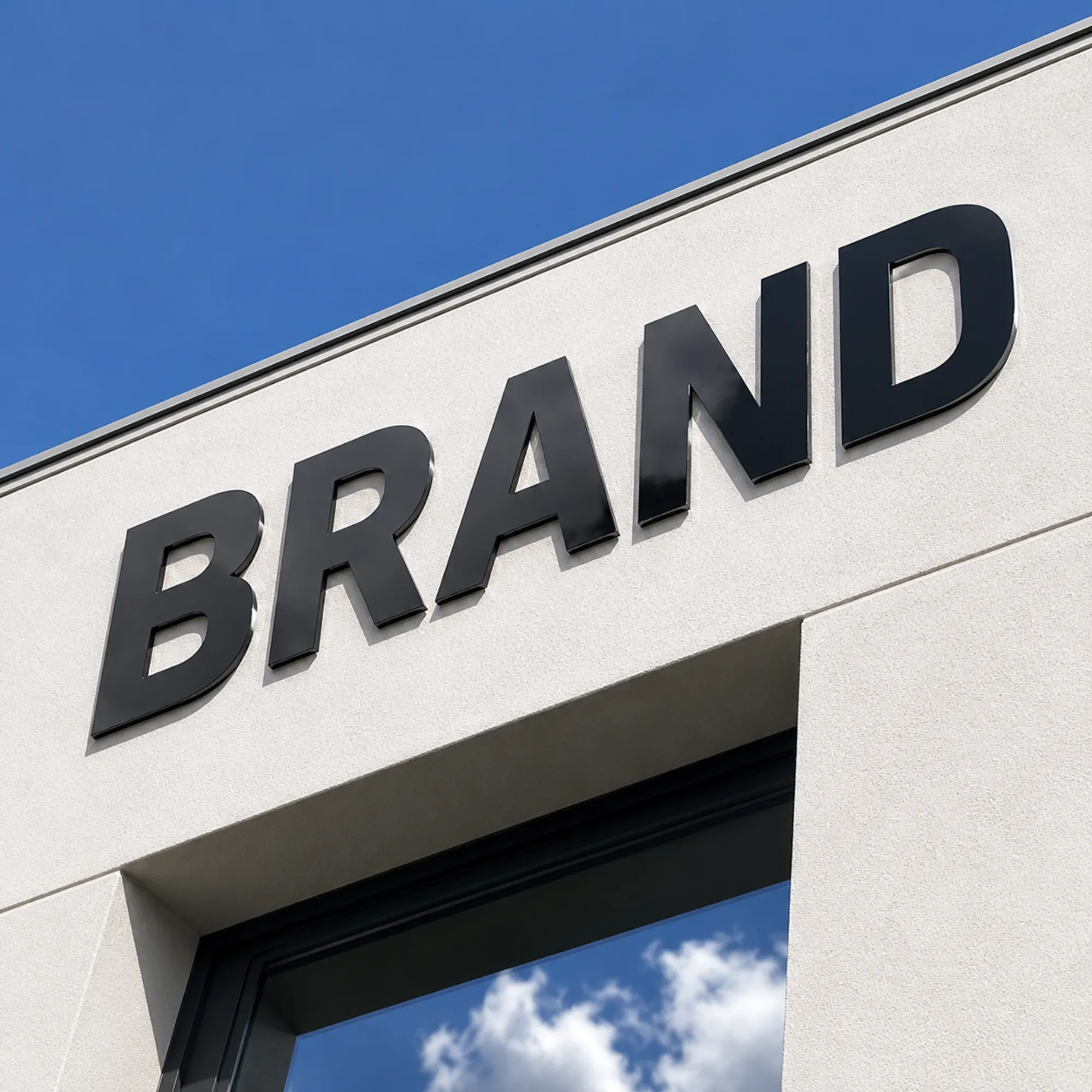 Czarne litery z Dibondu – napis BRAND