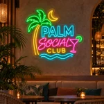 Kolorowy neon z logo firmy Palm Social Club z palmą i księżycem