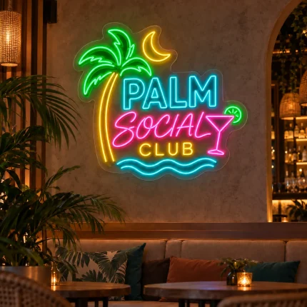Kolorowy neon z logo firmy Palm Social Club z palmą i księżycem